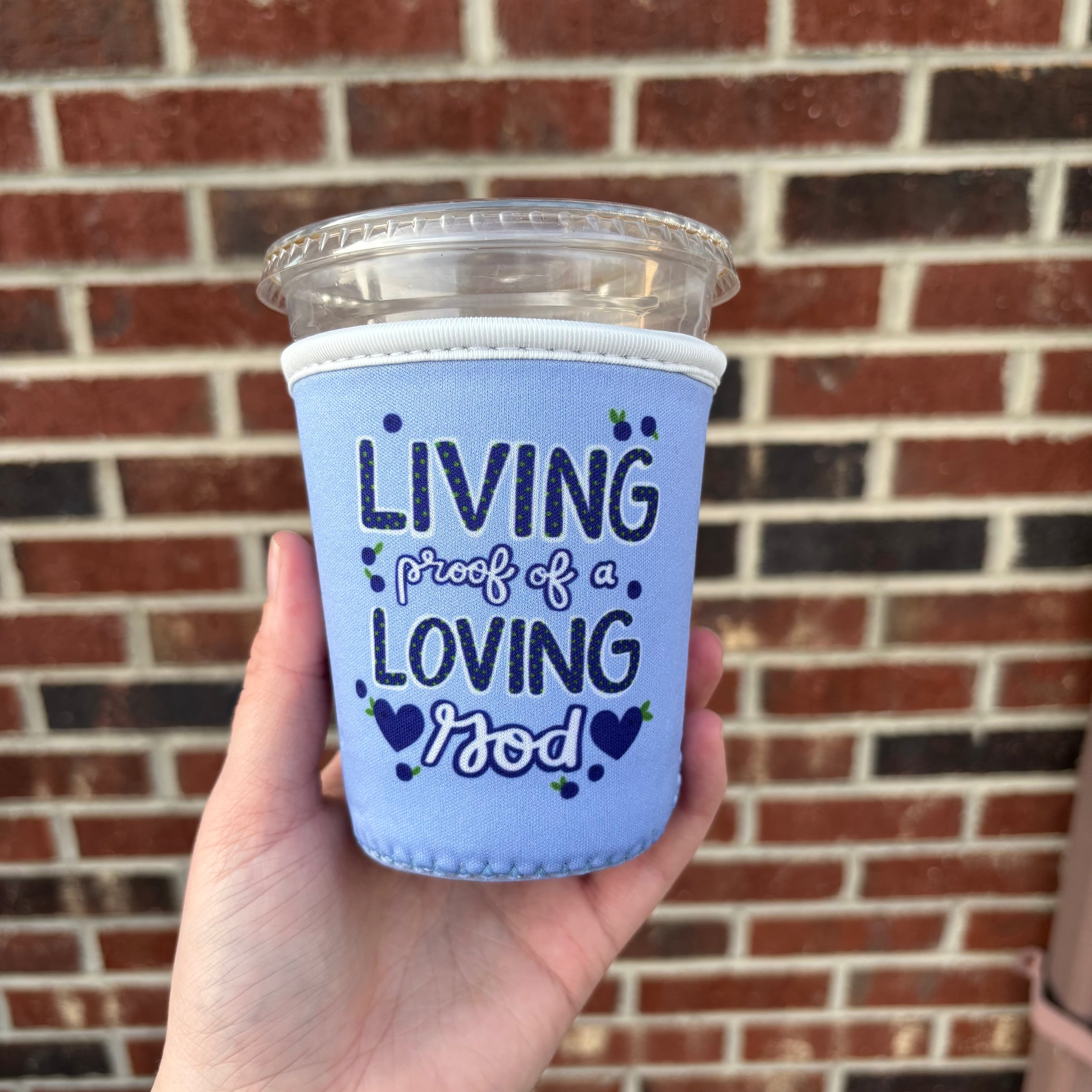 Living Proof of a Loving God Coffee Sleeve